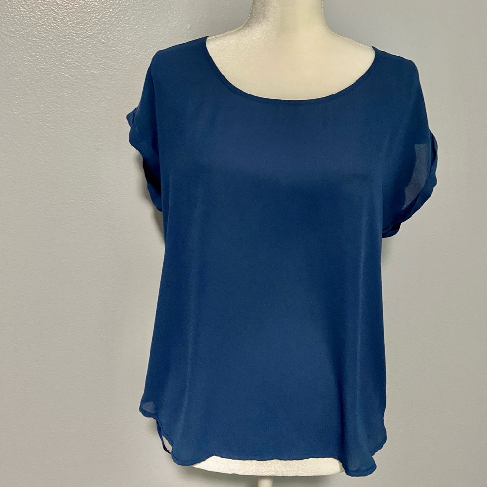 Pink Rose dark teal blue blouse, s/s, sheer, back is longer in length